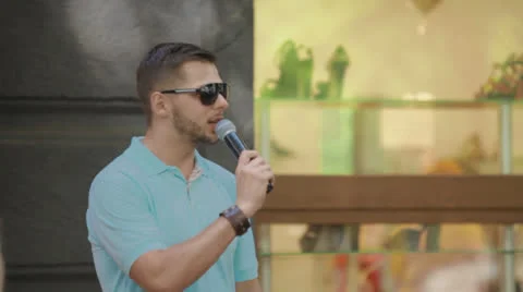 Man speaks into a microphone Stock Footage 23891455