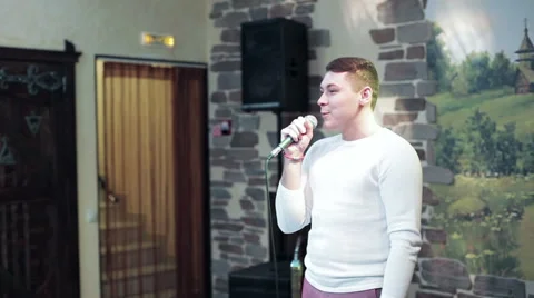 Man speaks into a microphone Stock Footage 59746727