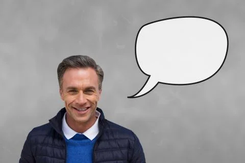 Man with speech bubble against grey background Stock Photos