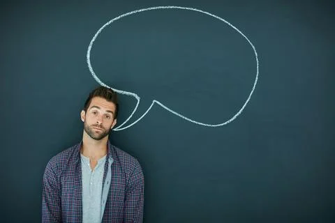 Man, speech bubble and idea in portrait, chalkboard and mockup space for op.. Stock Photos