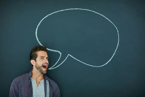 Man, speech bubble and talk in portrait, chalkboard and mockup space for op.. Stock Photos