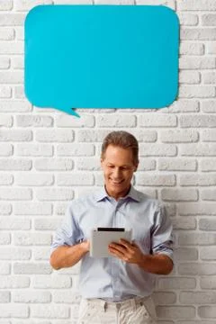 Man with speech bubbles Stock Photos