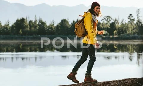 Man spending time enjoying nature in countryside Stock Photos