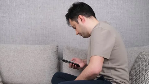 Man spends time online 스톡 동영상 268696173