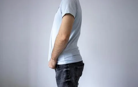 Man with a spinal curvature problem in the lower back hyperlordosis. Anatomy Stock Photos