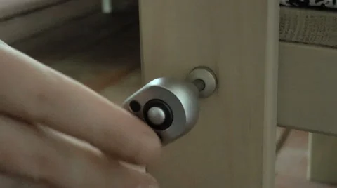 Man spins the screw with a screwdriver Stock Footage 68288623