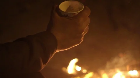 A man spits a full glass Stock Footage 129582341