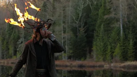 Man spitting fire and drinking paraffin Stock Footage 145005884