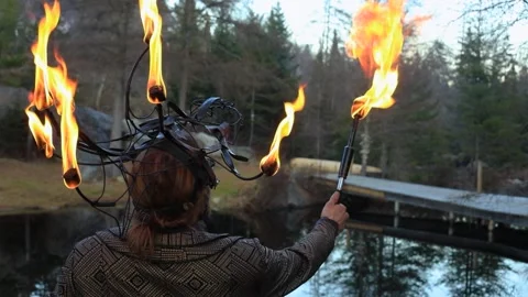Man spitting paraffin forming flame Stock Footage 145013373