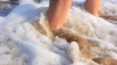 Man in splashing waves Stock Footage 45574236