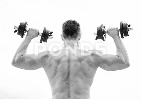Man sportsman weightlifting. steroids. fitness and sport equipment. Muscular Stock Photos
