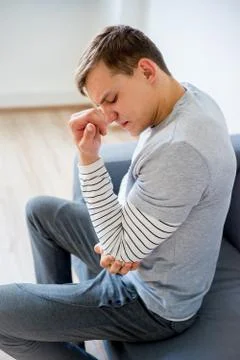 Man sprained his arm Stock Photos