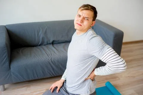 Man sprained his back Stock Photos
