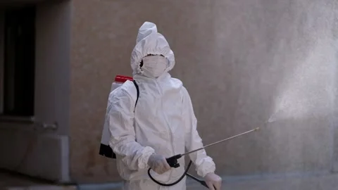 A man spraying against Delta Plus Variant of covid 19 virus Stock Footage 241742675