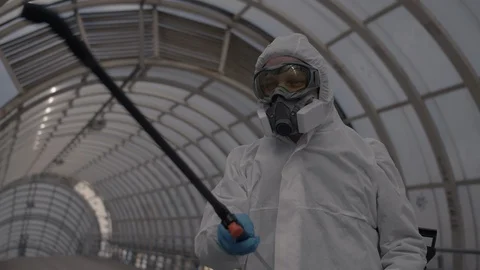 Man sprays an antibacterial solution Stock Footage 129332741