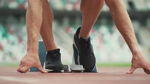 Man sprinter is preparing for the start of a training run in short-distance Video stock 160887506