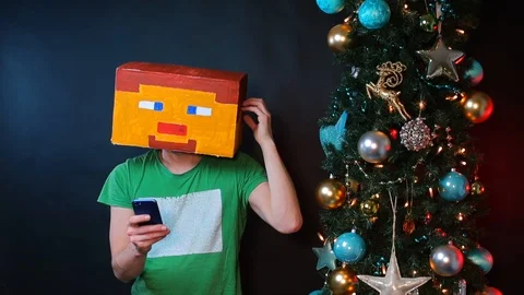 A man in a square mask on his head. Video stock 121253351