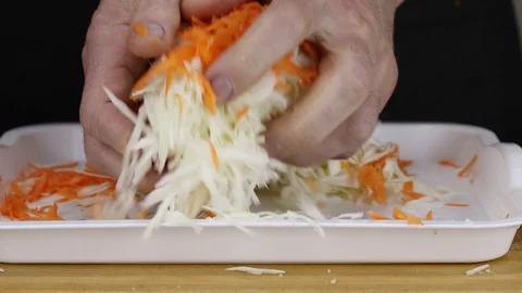 A man squeezes the juice Stock Footage 121705123