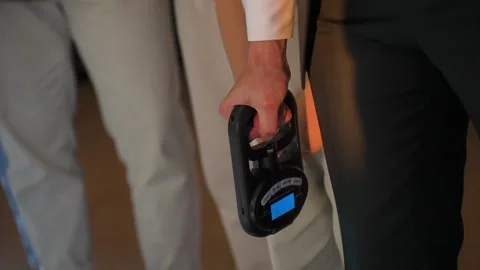 A man squeezes a wrist strength expander Stock-Footage 329092536