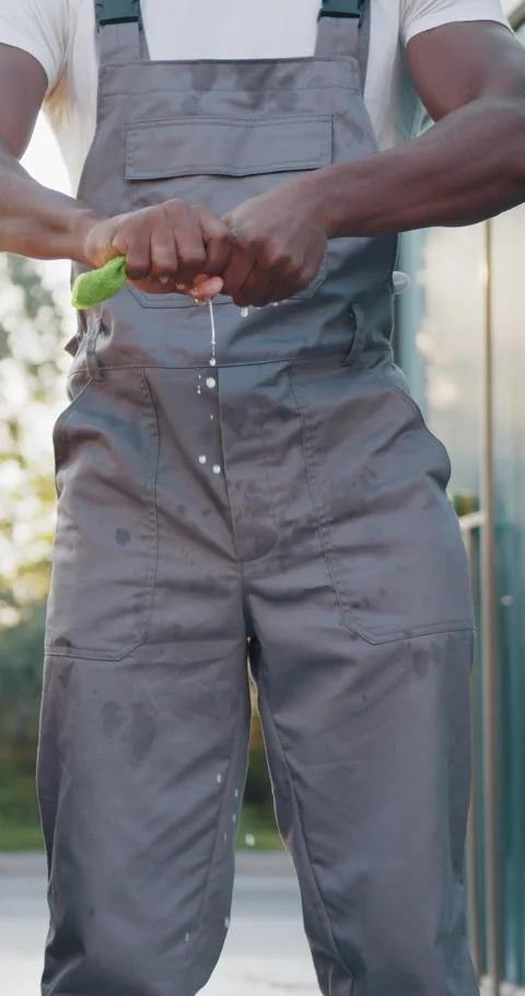 Man Squeezing Wet Cloth Stock Footage 319349688
