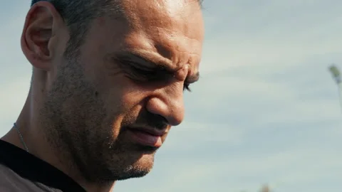 Man squinting his eyes and making grimaces Stock Footage 331517586