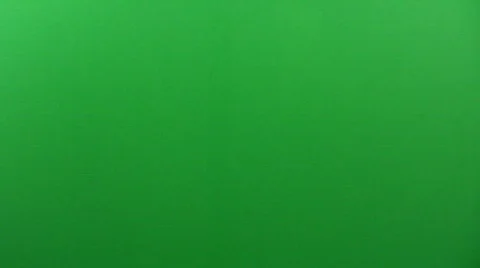 Man Stabs Sombody with a Knife In Front of a Green Screen Stock Footage
