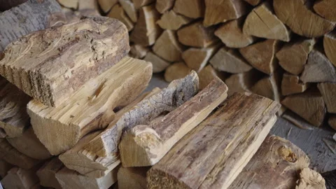 Man stacking fire wood Stock Footage 328940937