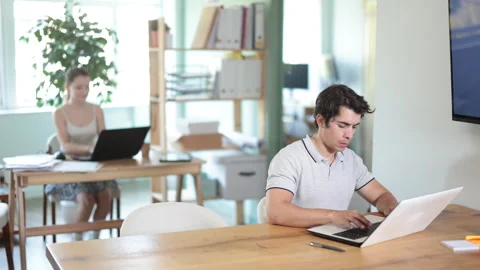 Man staff working at laptop computer in office room space Stock Footage 341534442