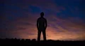 The man stand against the background of the cloud stream. Time lapse. Wide angle 4k or 4k+ Resolution