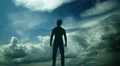 The man stand against the background of volume cloud. Time lapse. Wide angle 4k or 4k+ Resolution