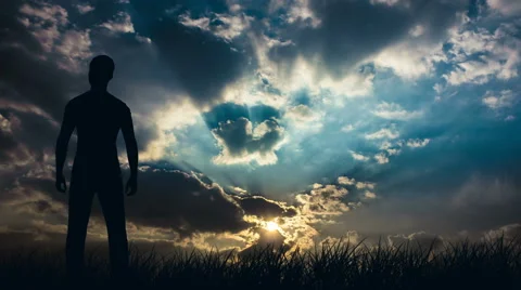 The man stand against the rain clouds. Real time capture. Wide angle Stock Footage 61149203