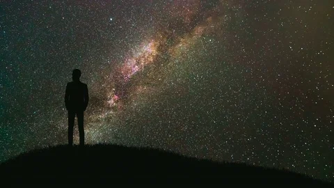 The man stand against the starry sky. time lapse, night time Stock Footage 78917610