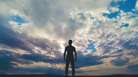 The man stand on the background of cloud flow. Time lapse Stock Footage 63103296