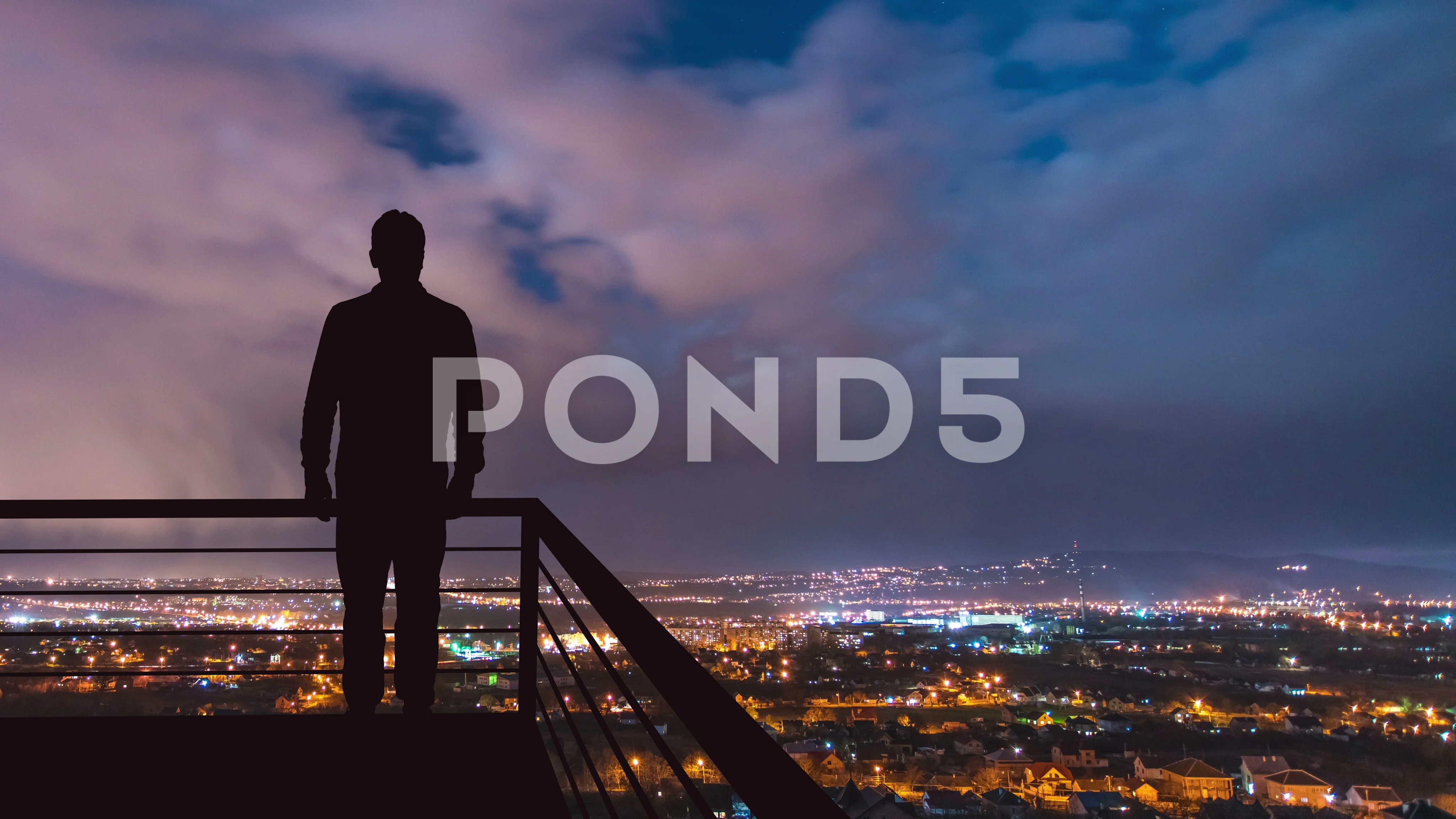 The man stand on the balcony on the back... | Stock Video | Pond5
