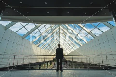The man stand on the bridge in the business center Stock Photos