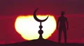 The man stand near the Islam symbol against the background of sunset. Real time 4k or 4k+ Resolution