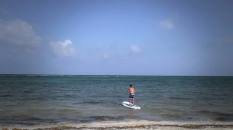 Man on Stand Up Paddle Board Stock Footage 36869554