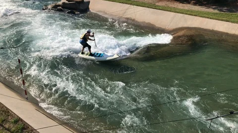 Man stand up Paddle in River Rapids Stock Footage 93149839