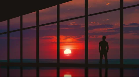 Man stand at the panoramic window on the background sunset. Time lapse Stock-Footage 68981912