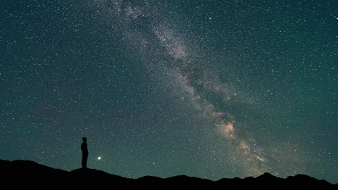 The man stand on a starry sky background. timelapse Stock Footage 160124766