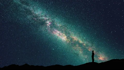 The man stand on a starry sky background. time lapse Stock Footage 160124897