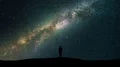 The man standing against the starry sky. time lapse 4k or 4k+ Resolution
