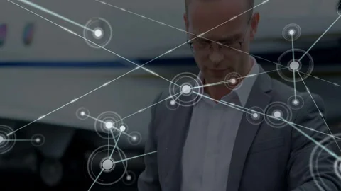 Man standing on airport ramp while node appearing, expanding, obscuring jet, Stock Footage 332566128