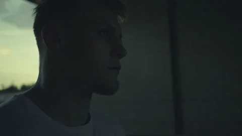 Man Standing and Looking Out under a Bridge Vidéo 313958280