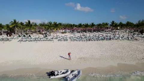 A man standing at Bahamas Bimini beach Video stock 232437174