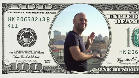 Man standing on balcony in frame 100 dollar bill Stock Footage 96725064