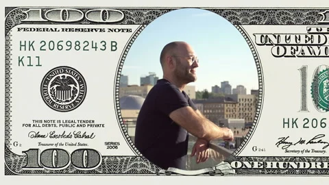 Man standing on balcony in frame 100 dollar bill Stock Footage 97000227