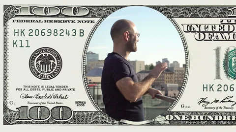 Man standing on balcony in frame 100 dollar bill Stock Footage 97474042