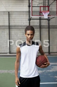 Man Standing On Basketball Court