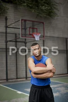Man Standing On Basketball Court
